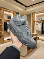 Nike Air Jordan 4 Wet Cement Trainers