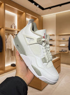 Air Jordan 4 Retro White Oreo Trainers