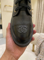 Chanel Black Lace-Up Boots