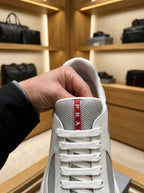 Prada America’s Cup White/Silver Patent Leather Trainers