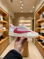 Nike x Travis Scott Air Jordan 1 Low Shy Pink & Tropical Pink Trainers