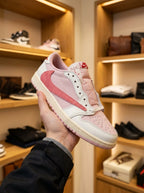 Travis Scott x Air Jordan 1 Low Sail/Tropical Pink Trainers
